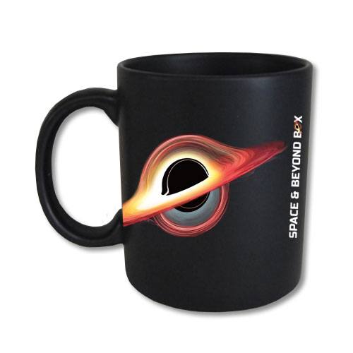 A black mug showing an illustration of the black hole and the Space and Beyond Box logo