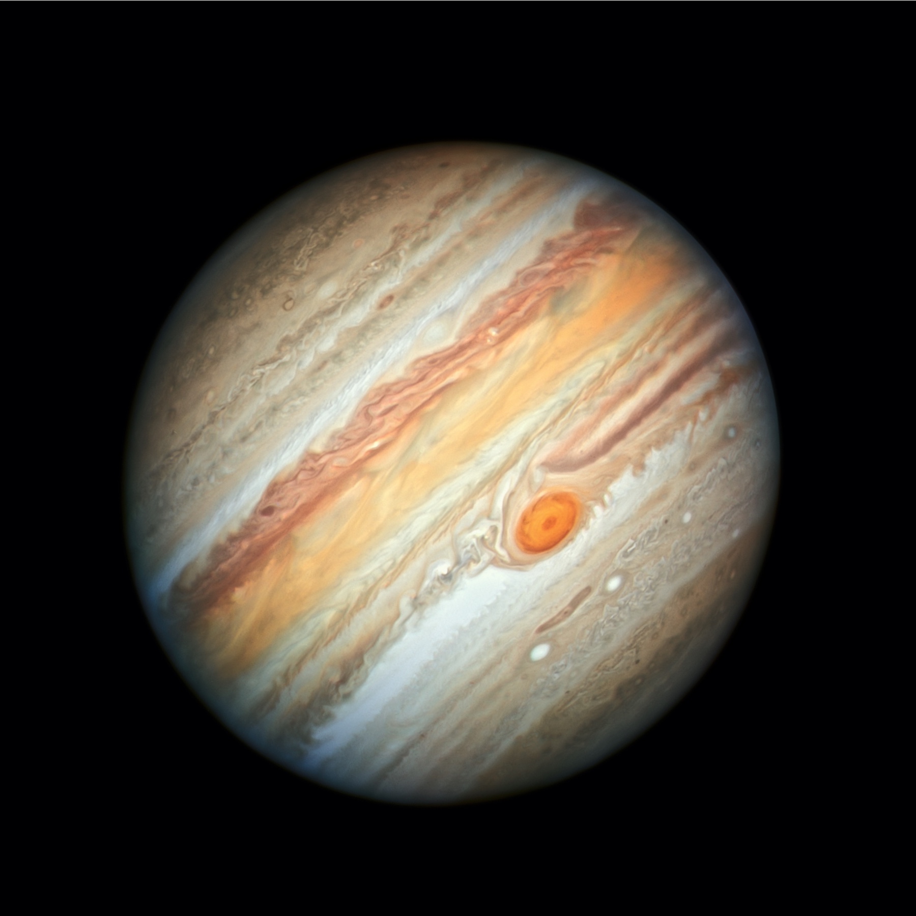 A picture of the orange planet Jupiter against a black background.